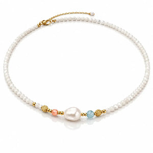 A delicate pearl necklace with a central white baroque pearl, accented by a peach bead, a light blue faceted bead, and textured gold spacer beads, on a clean white background.