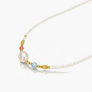 18K gold vermeil necklace with white pearls, gold beads, and pastel gemstone accents on white background