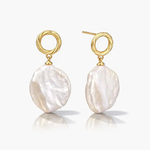 Baroque pearl drop earrings with twisted 18K gold vermeil hoops on white background