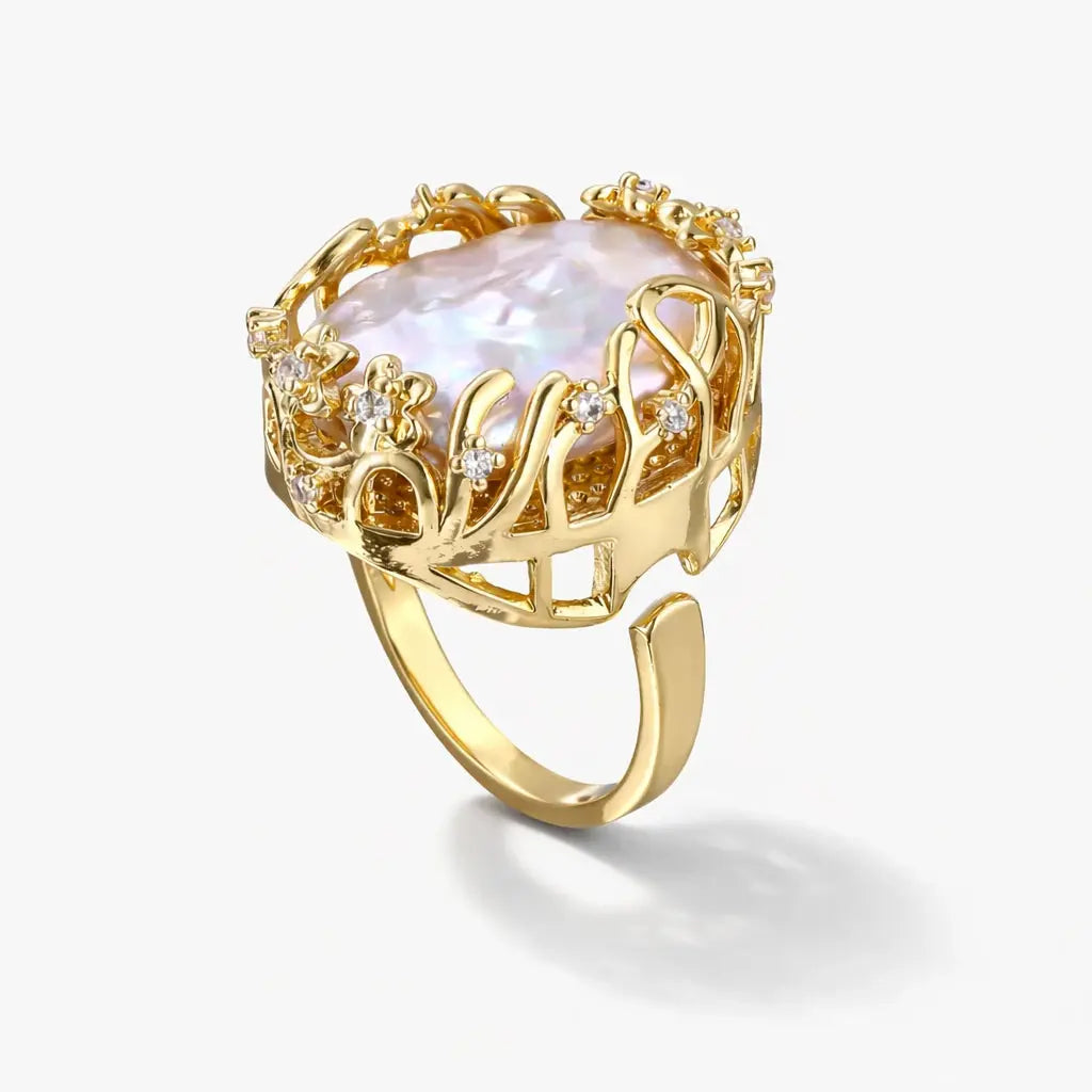 14K gold ring with large baroque pearl and delicate crown-inspired diamond accents