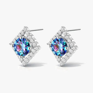 Silver stud earrings with round rainbow moissanite center and diamond halo accents