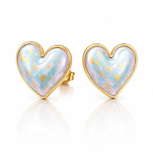 Heart-shaped earrings with gold rim and light blue interior on a white background