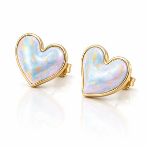 Heart-shaped earrings with gold frames and multicolored centers on a white background