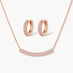 14K gold plated CZ necklace and hoop earrings jewelry set on white background