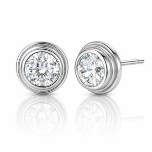 Pair of diamond stud earrings on a white background
