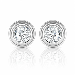Pair of diamond stud earrings on a white background