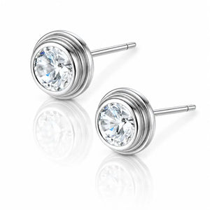 Pair of silver stud earrings with clear gemstones on a white background