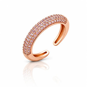 A rose gold open-ended ring featuring two rows of pavé-set pink gemstones, shown on a clean white background with a soft reflection below.