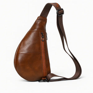 Ryder men’s genuine leather chest shoulder crossbody bag in Coffee, Brown, or Black with top zipper and adjustable strap.
