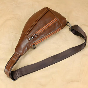 Ryder men’s genuine leather chest shoulder crossbody bag in Coffee, Brown, or Black with top zipper and adjustable strap.