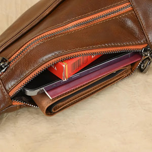 Ryder men’s genuine leather chest shoulder crossbody bag in Coffee, Brown, or Black with top zipper and adjustable strap.
