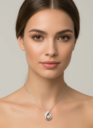 Serenova S925 silver smart pendant necklace with dancing sparkle, CZ inlay, adjustable 21–50 cm chain—heart, droplet, U-shape, and cross styles.