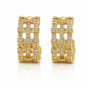 A pair of gold huggie hoop earrings with a woven basket design, embellished with clear pavé-set round stones, shown on a white background with a soft reflection.