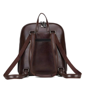 Casual Travel Leather Backpack in PU leather with zipper closure, available in Black and Brown, lightweight and spacious for daily essentials.