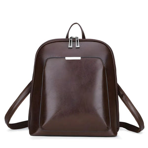 Casual Travel Leather Backpack in PU leather with zipper closure, available in Black and Brown, lightweight and spacious for daily essentials.