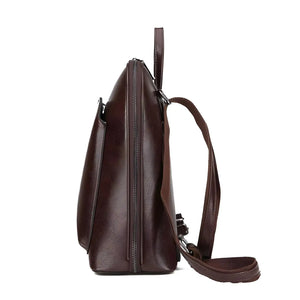 Casual Travel Leather Backpack in PU leather with zipper closure, available in Black and Brown, lightweight and spacious for daily essentials.