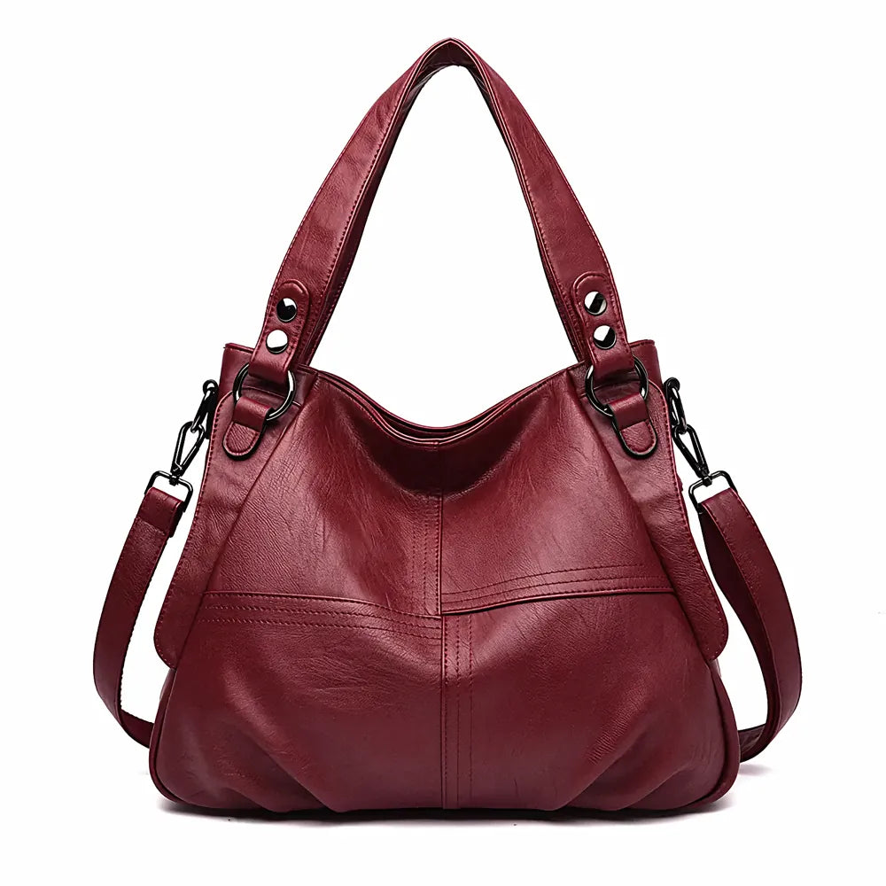 Elegant genuine leather large capacity shoulder bag in classic design with versatile carrying options – by Jewellar