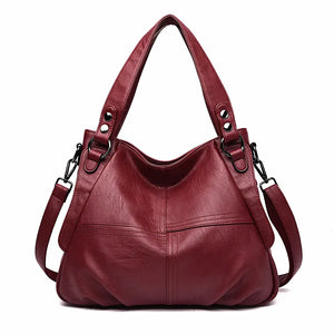 Elegant genuine leather large capacity shoulder bag in classic design with versatile carrying options – by Jewellar