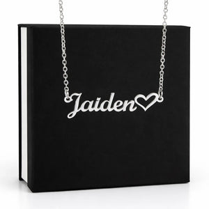 Silver 'Jaiden' necklace with a heart charm on a black box background