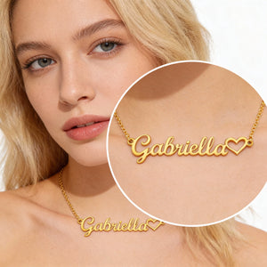 Gold name necklace with 'Gabriella' on a model, close-up of necklace detail.
