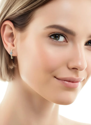 NovaFlare S925 sterling silver moissanite stud earrings, 0.36 ct each, white or gold finish with push-back closures.