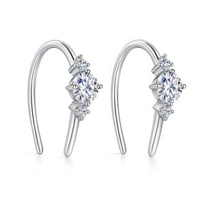 NovaFlare S925 sterling silver moissanite stud earrings, 0.36 ct each, white or gold finish with push-back closures.