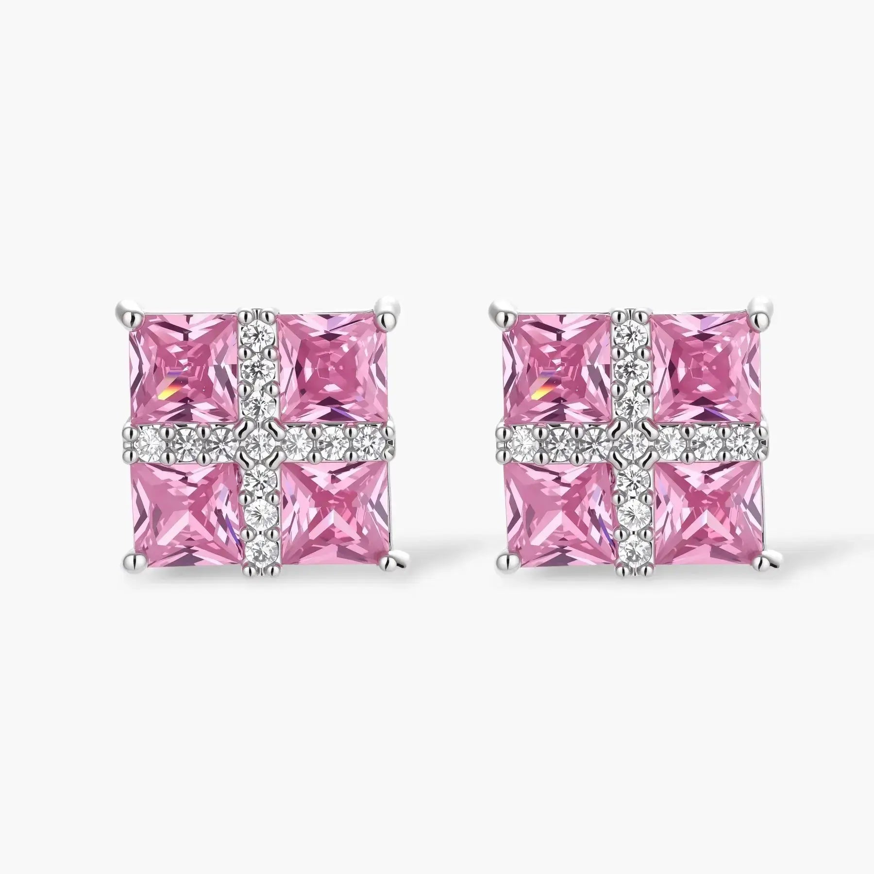 Square pink gemstone stud earrings with cross pattern of sparkling clear stones on white background