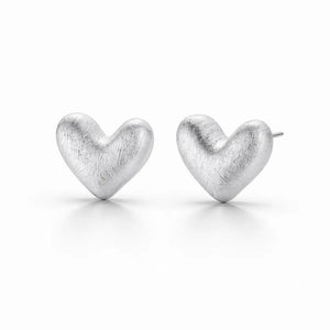 Pair of silver heart-shaped earrings on a white background