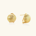 Gold spherical earrings on a white background