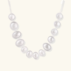 Pearl necklace on a white background