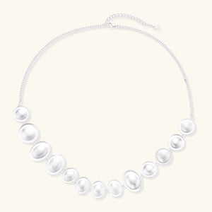 Pearl necklace on a white background