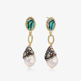 Baroque pearl drop earrings with abalone studs, gold accents, and crystal embellishments