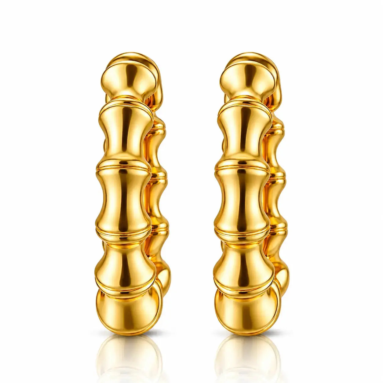 A pair of gold hoop earrings with a textured, segmented design resembling stacked bamboo or beads, shown on a clean white background with a soft reflection below.