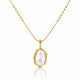 A gold necklace with a beaded chain and a bezel-set irregular baroque pearl pendant, shown on a clean white background with a soft reflection below.