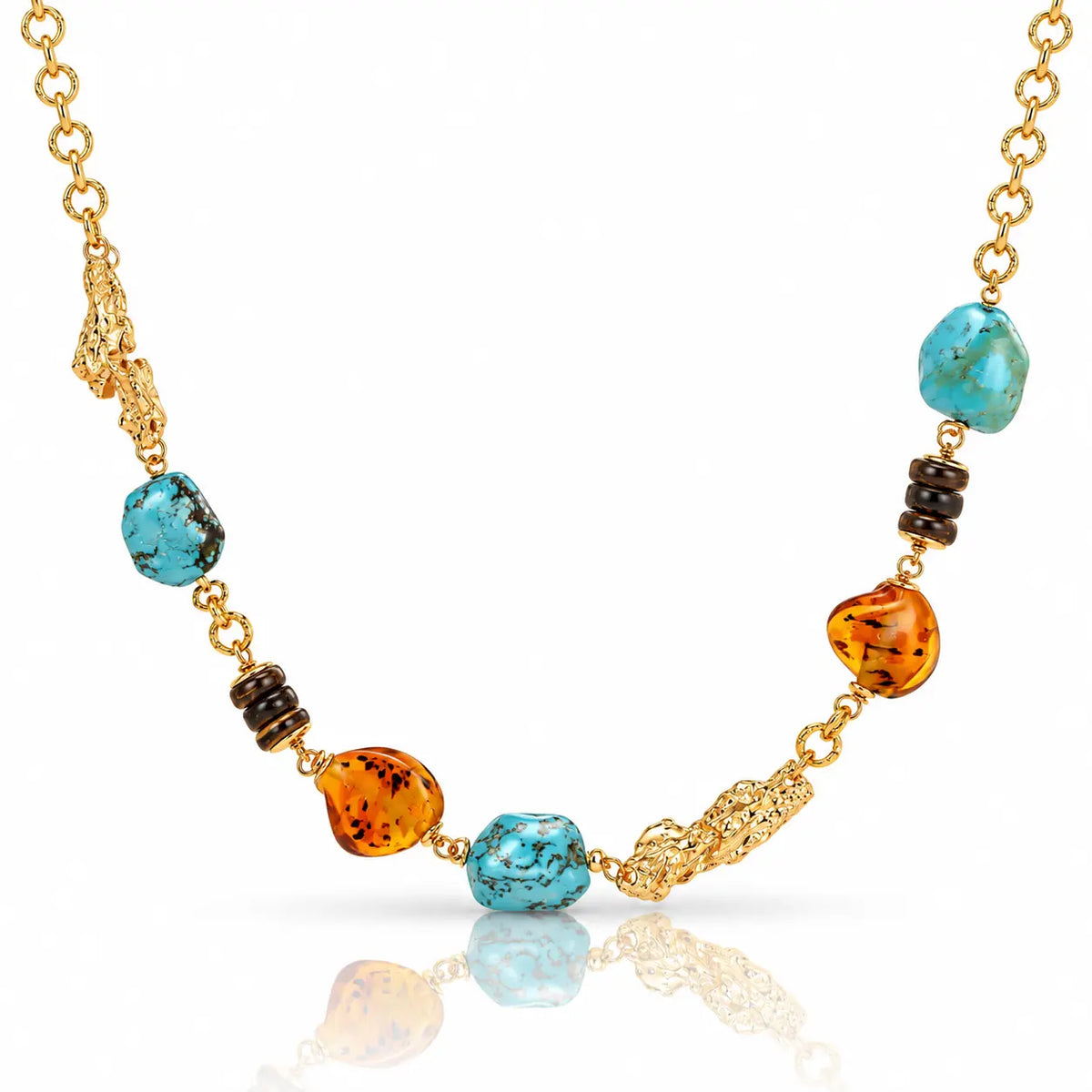 A gold chain necklace featuring turquoise, amber, and dark brown beads, displayed on a clean white background with a soft reflection.