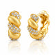 A pair of gold huggie hoop earrings with pavé diamond accents, shown from both the front and side angles on a reflective white surface. The side view shows a 'S925' sterling silver mark on the inside.