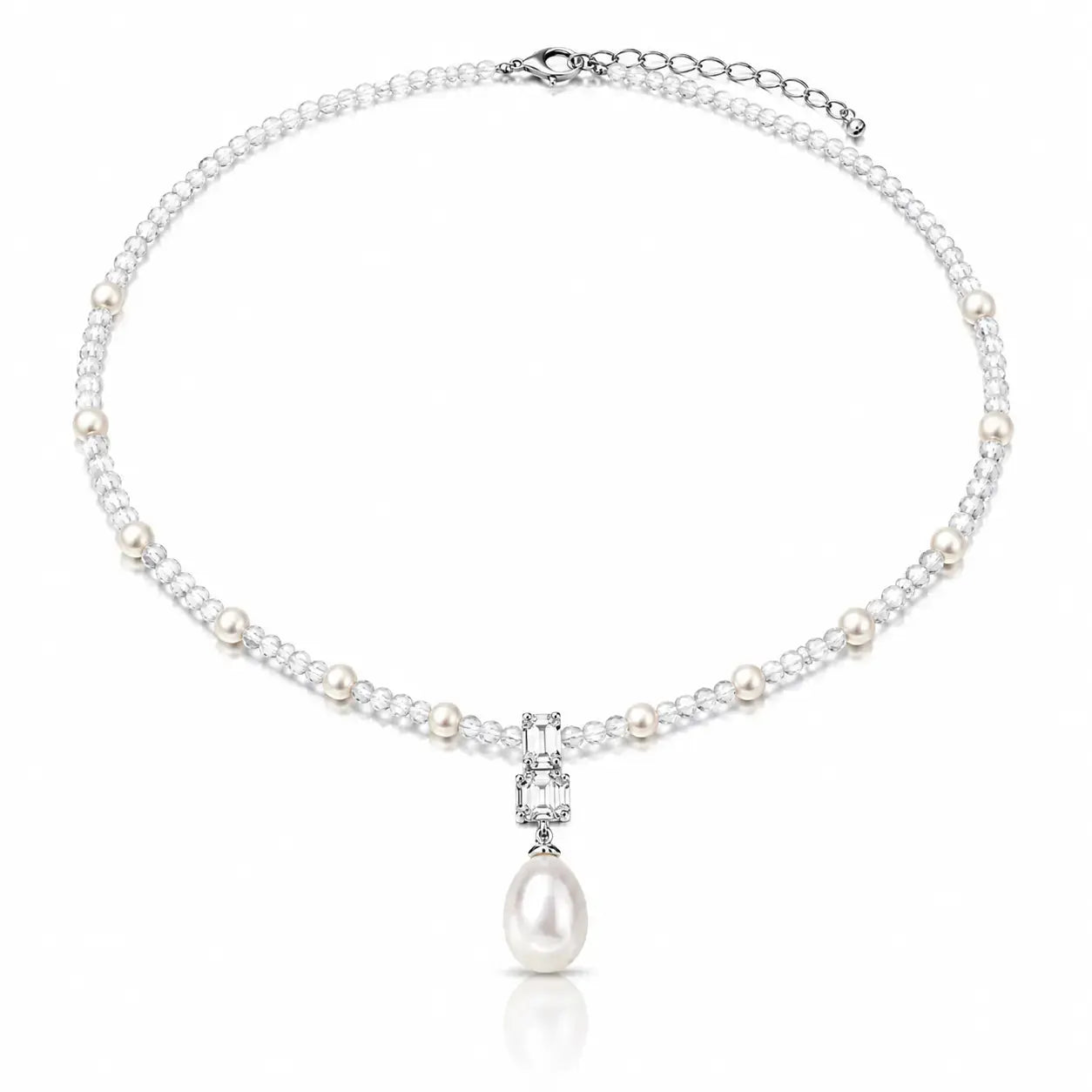 A silver-toned pearl necklace featuring a delicate chain of white pearls and clear cubic zirconia stones, with a central pendant showcasing a larger white pearl and a small rectangular clear stone, set against a plain white background.