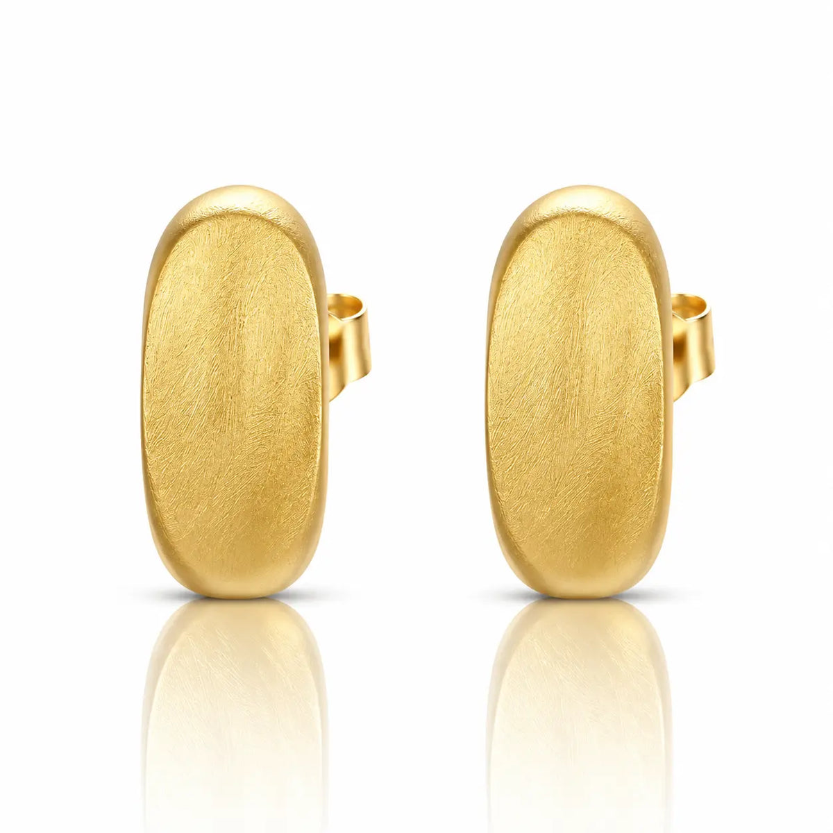 A pair of gold oval hoop earrings with a textured matte finish, displayed on a clean white background with a soft reflection below.