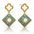 Pair of gold earrings with turquoise accents and a central pearl on a white background