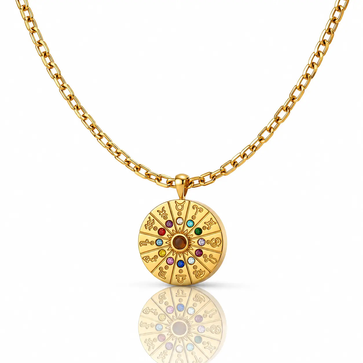 Gold necklace with a circular pendant featuring colorful stones on a white background