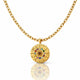 Gold necklace with a circular pendant featuring colorful stones on a white background