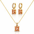 Gold jewelry set featuring a necklace and matching hoop earrings with square peach-colored gemstones and small clear accent stones, displayed on a clean white background.