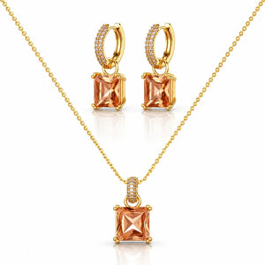 Gold jewelry set featuring a necklace and matching hoop earrings with square peach-colored gemstones and small clear accent stones, displayed on a clean white background.