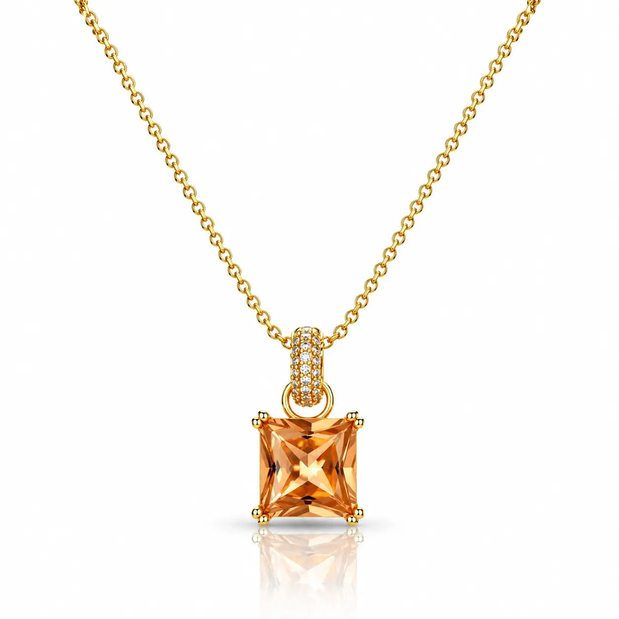 A gold necklace with a princess-cut orange gemstone pendant and a small diamond-accented bail, shown on a clean white background with a soft reflection below.