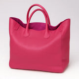 Black genuine leather super tote bag with large capacity, dual handles, and structured square shape – Chic Leather Super Tote.