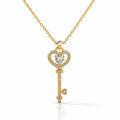 Gold key-shaped pendant necklace with diamonds on a white background