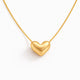 Gold heart-shaped pendant on a white background