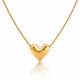 Gold heart-shaped pendant on a chain against a white background