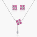 Jewelry set with pink gemstone necklace and earrings on a white background