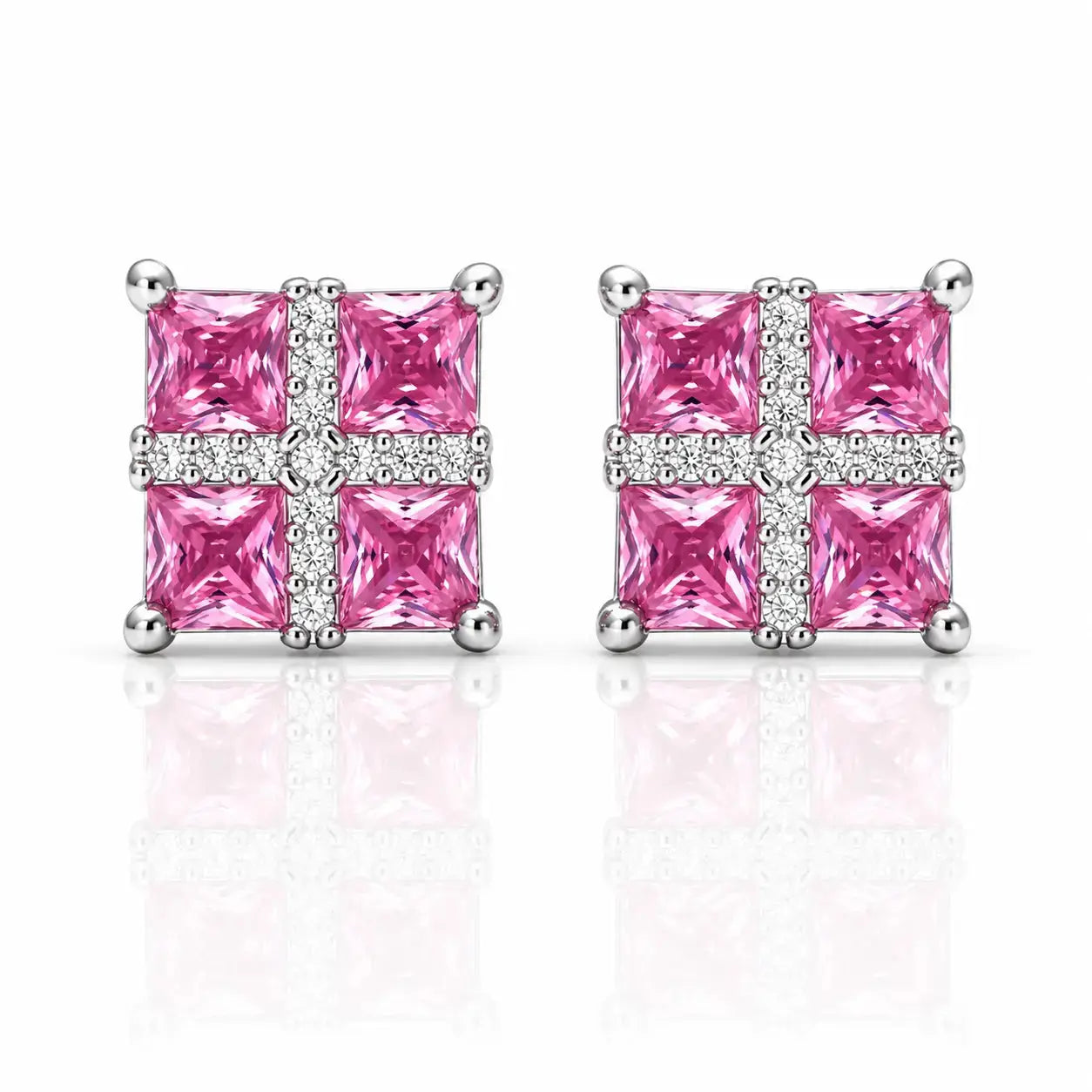 A pair of square stud earrings featuring four bright pink princess-cut stones arranged in a cross pattern with a border of small clear stones, set in silver-toned metal on a white background with a soft reflection.